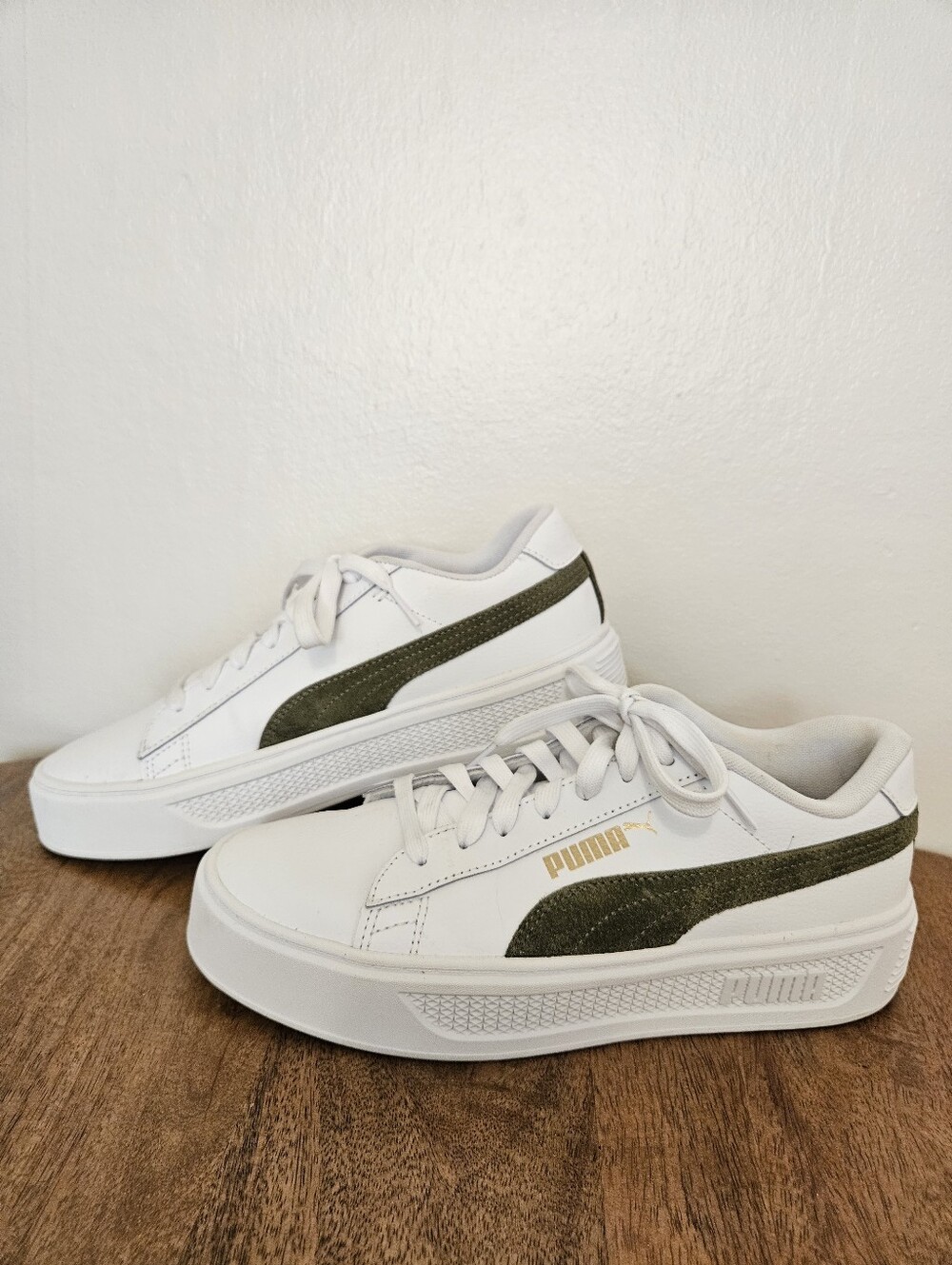 Puma White Sneakers with Olive Green Suede Stripe and Gold Logo